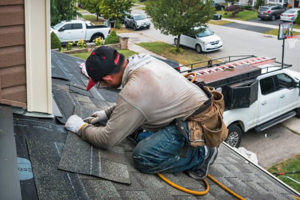 Professional Flat Roof Repair technician working in Plainfield, NH